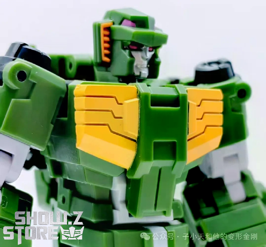 Green yellow and black transformer fully assembled showing articulation Green yellow and black transformer fully assembled showing articulation