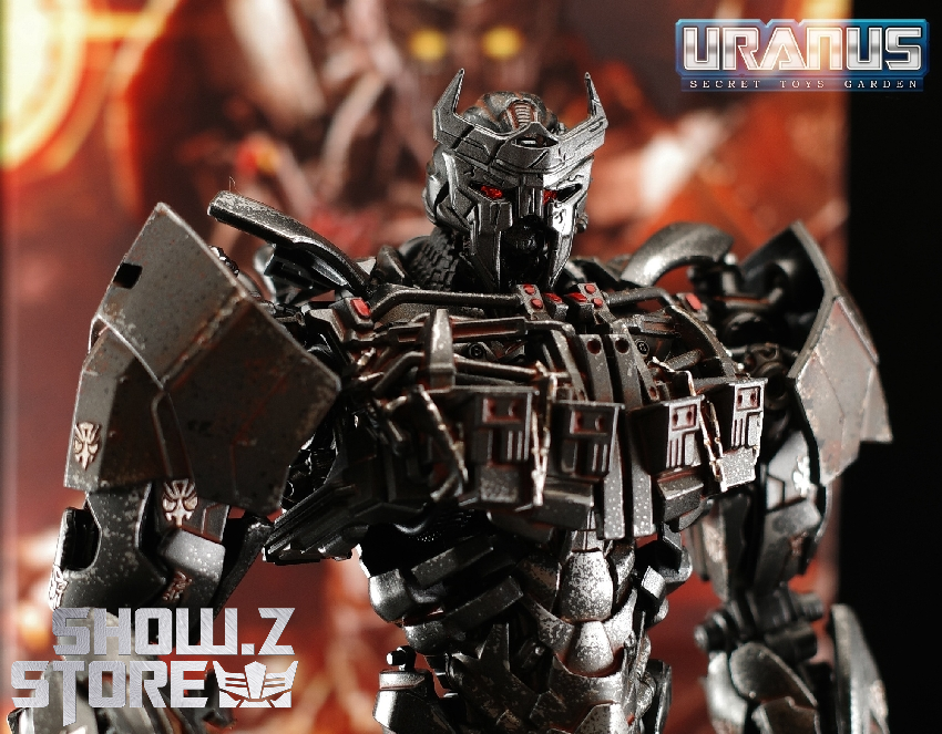 AMK Pro transformers figure in dramatic action pose with weapon display AMK Pro transformers figure in dramatic action pose with weapon display