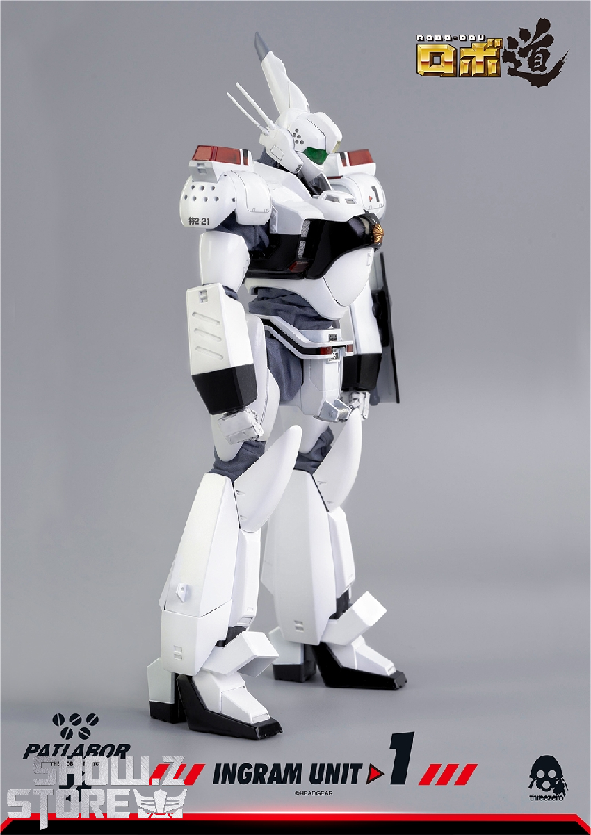White police mecha with red chest stripe in action position White police mecha with red chest stripe in action position