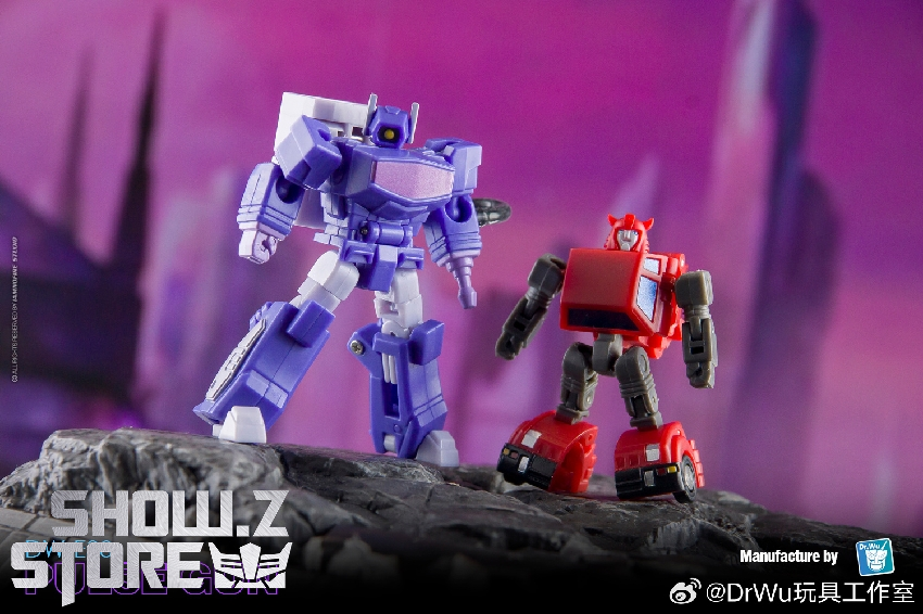 DW-E37 blue red mech robot humanoid form against purple backdrop DW-E37 blue red mech robot humanoid form against purple backdrop