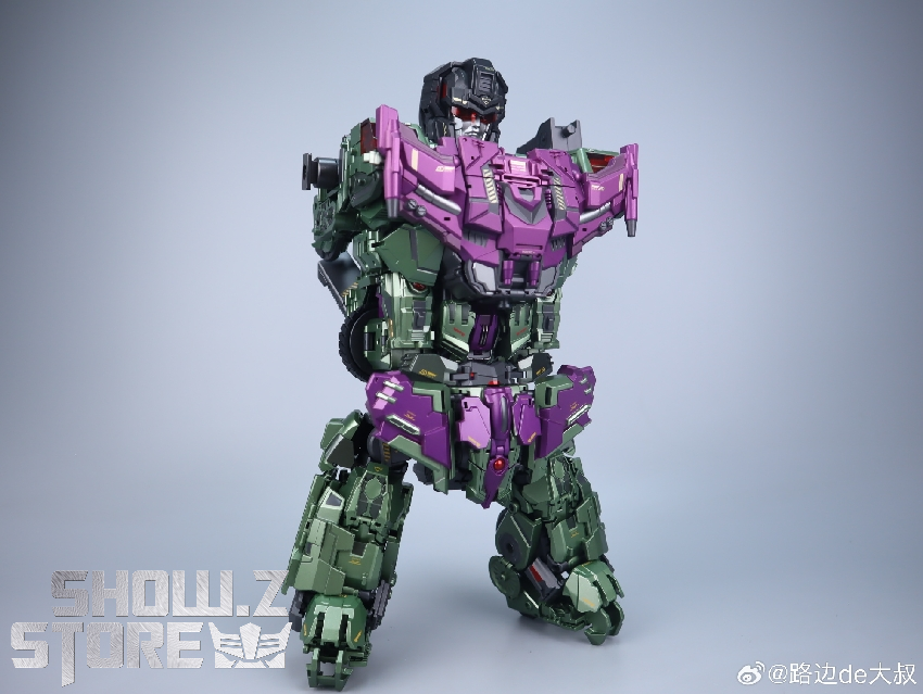 Long Haul standing robot figure with green purple color blocking visible Long Haul standing robot figure with green purple color blocking visible