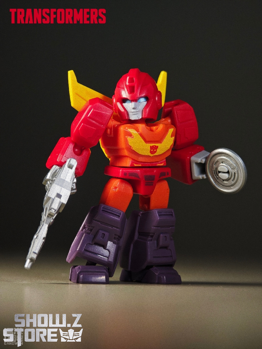Red yellow Transformers robot character weapon battle pose Red yellow Transformers robot character weapon battle pose