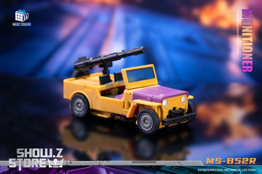 Yellow purple mechanical robot figure with weapons armor details Yellow purple mechanical robot figure with weapons armor details