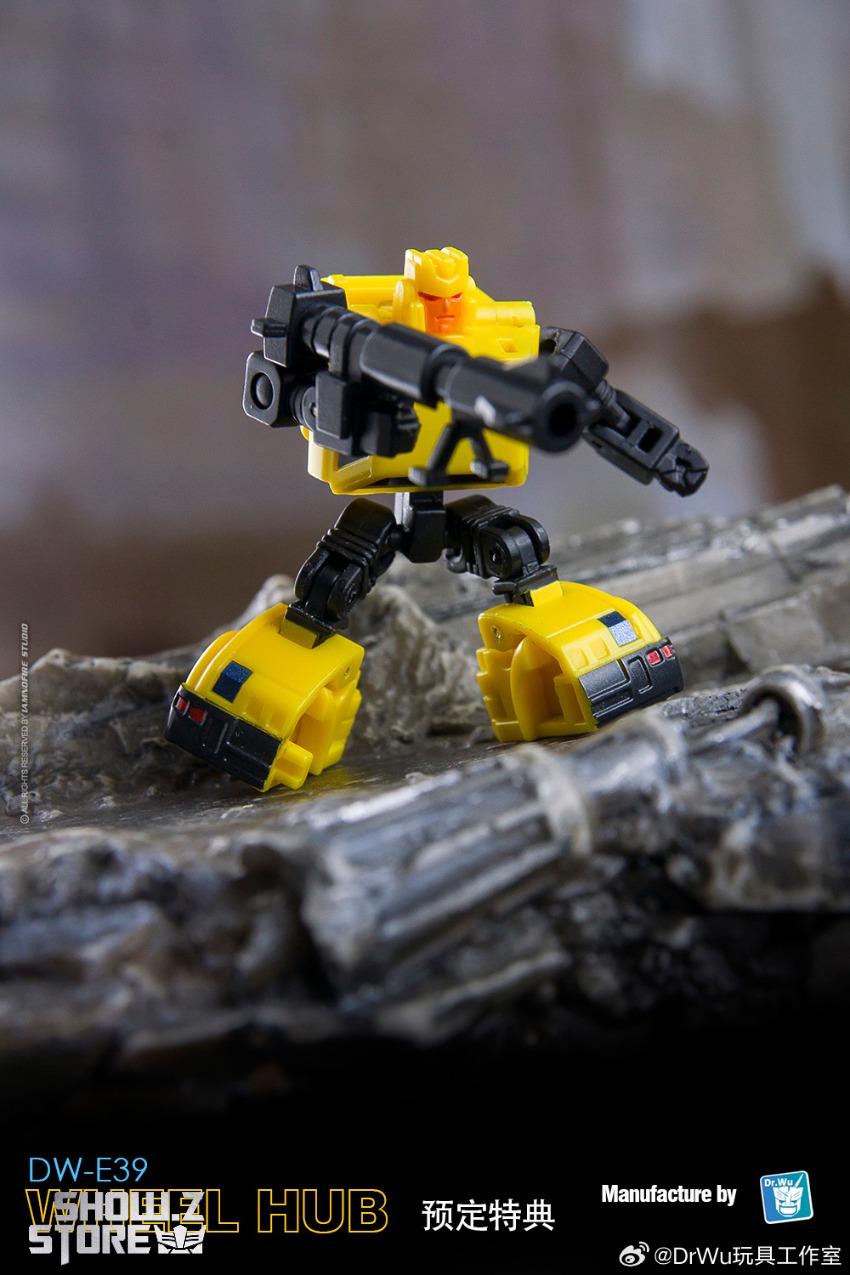 Transformation robot in yellow black standing on rocky terrain Transformation robot in yellow black standing on rocky terrain