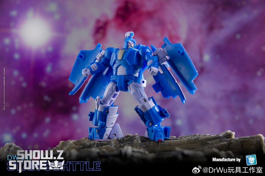Blue Transformer robot standing on textured ground with pink energy Blue Transformer robot standing on textured ground with pink energy