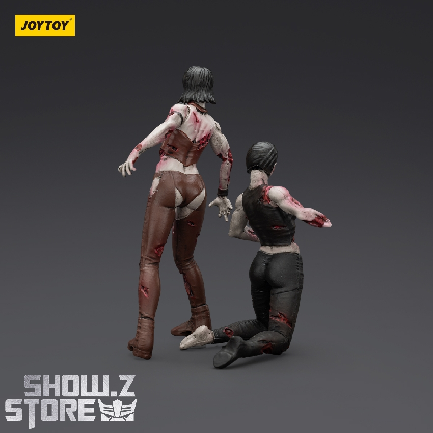 Female zombie figure black brown clothing showing articulation poses Female zombie figure black brown clothing showing articulation poses