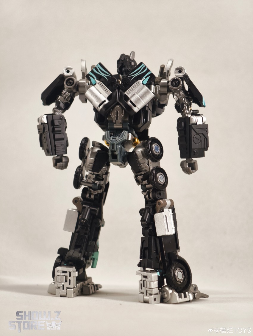 Standing pose of black and teal armored robot figure with dynamic stance Standing pose of black and teal armored robot figure with dynamic stance