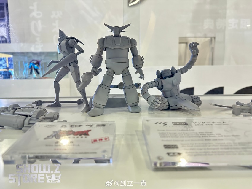 Getter Robo robot trio in dynamic combat poses with weapons and accessories Getter Robo robot trio in dynamic combat poses with weapons and accessories
