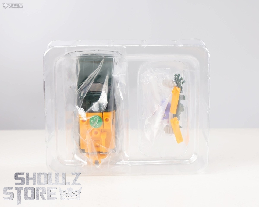 Colorful robot action figures in clear plastic display case showcase Colorful robot action figures in clear plastic display case showcase