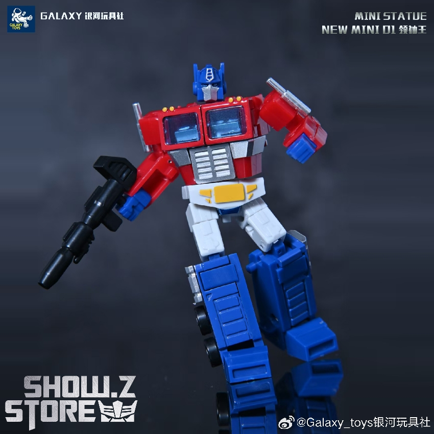 Optimus Prime figure front view with dual wielding weapons Optimus Prime figure front view with dual wielding weapons