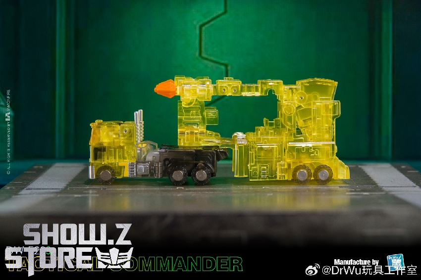 Full side view of transparent yellow Commander robot Full side view of transparent yellow Commander robot