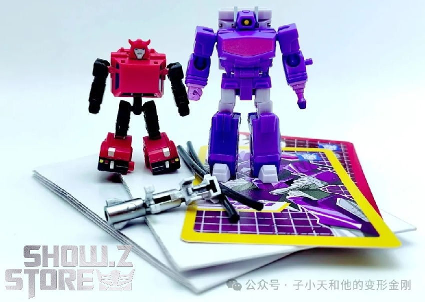 Red black robot figure with purple robot and instruction manual Red black robot figure with purple robot and instruction manual
