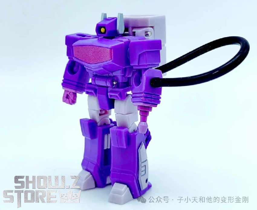 Purple robot alternate form showing transformation details Purple robot alternate form showing transformation details