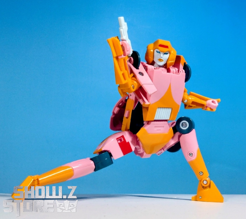 Pink white Arcee robot action pose extended arm cannon weapon Pink white Arcee robot action pose extended arm cannon weapon