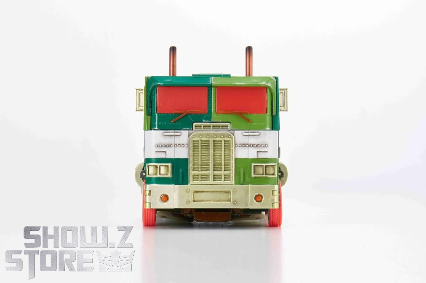 Magnificent Mecha MM-01G OP in green truck mode front view Magnificent Mecha MM-01G OP in green truck mode front view