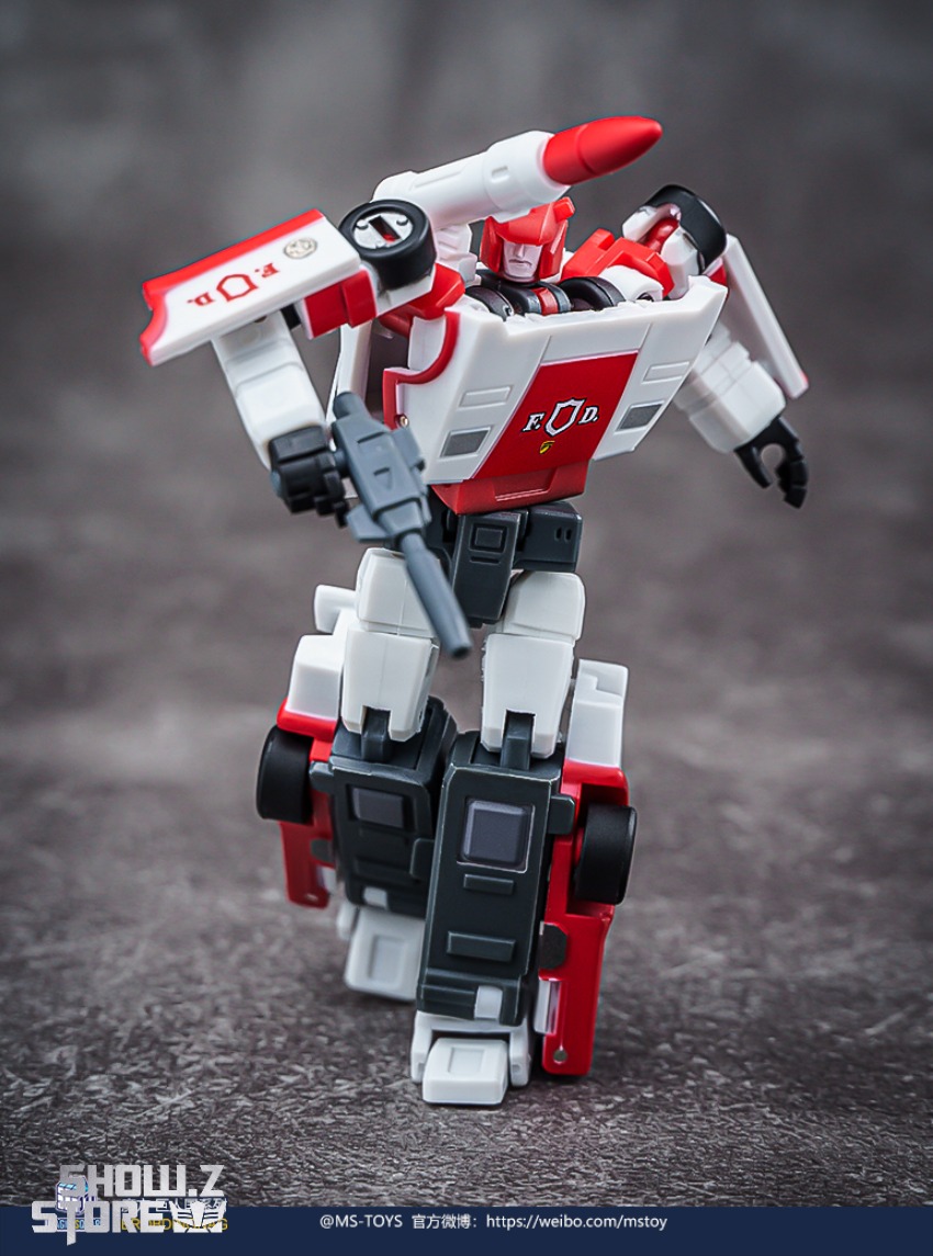 Red Alert Flame Patrol robot with missile launcher raised Red Alert Flame Patrol robot with missile launcher raised