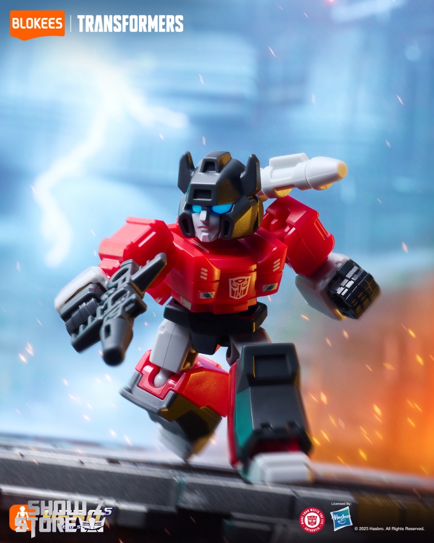Red robot Defender with weapons in battle pose Red robot Defender with weapons in battle pose