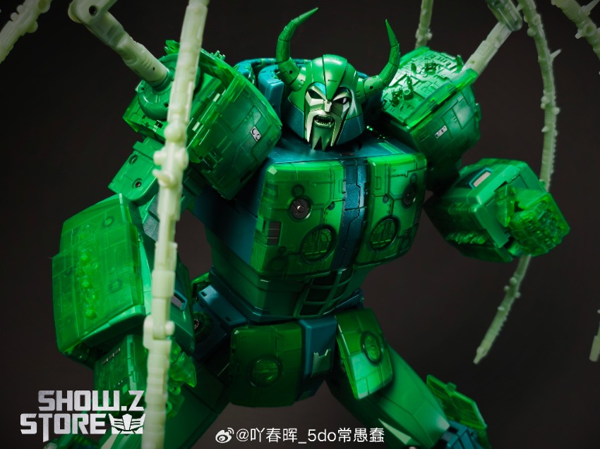 Unicron robot glowing green transparent armor pose Unicron robot glowing green transparent armor pose