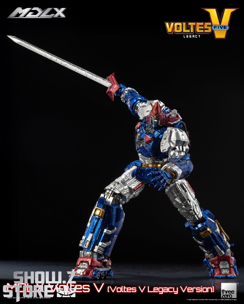 Blue and white Voltes V robot in action pose with sword Blue and white Voltes V robot in action pose with sword