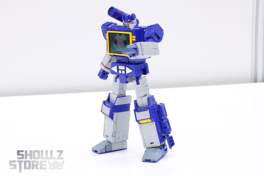 Robot with raised arm and flying vehicle component Robot with raised arm and flying vehicle component