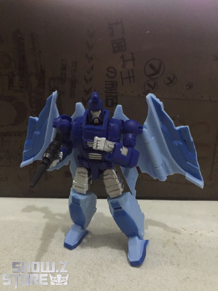White mech with blue accents in fighter jet mode White mech with blue accents in fighter jet mode