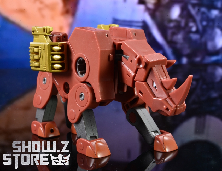 Ocular Max Forte red robot with missile launcher in action pose Ocular Max Forte red robot with missile launcher in action pose