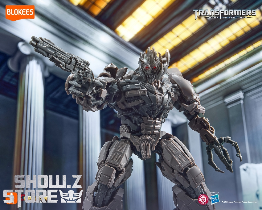 Megatron gray robot figure in metallic industrial environment Megatron gray robot figure in metallic industrial environment