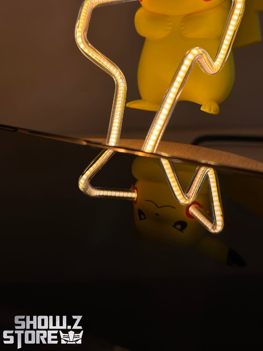 Pikachu charger side view showing glowing yellow neon frame Pikachu charger side view showing glowing yellow neon frame