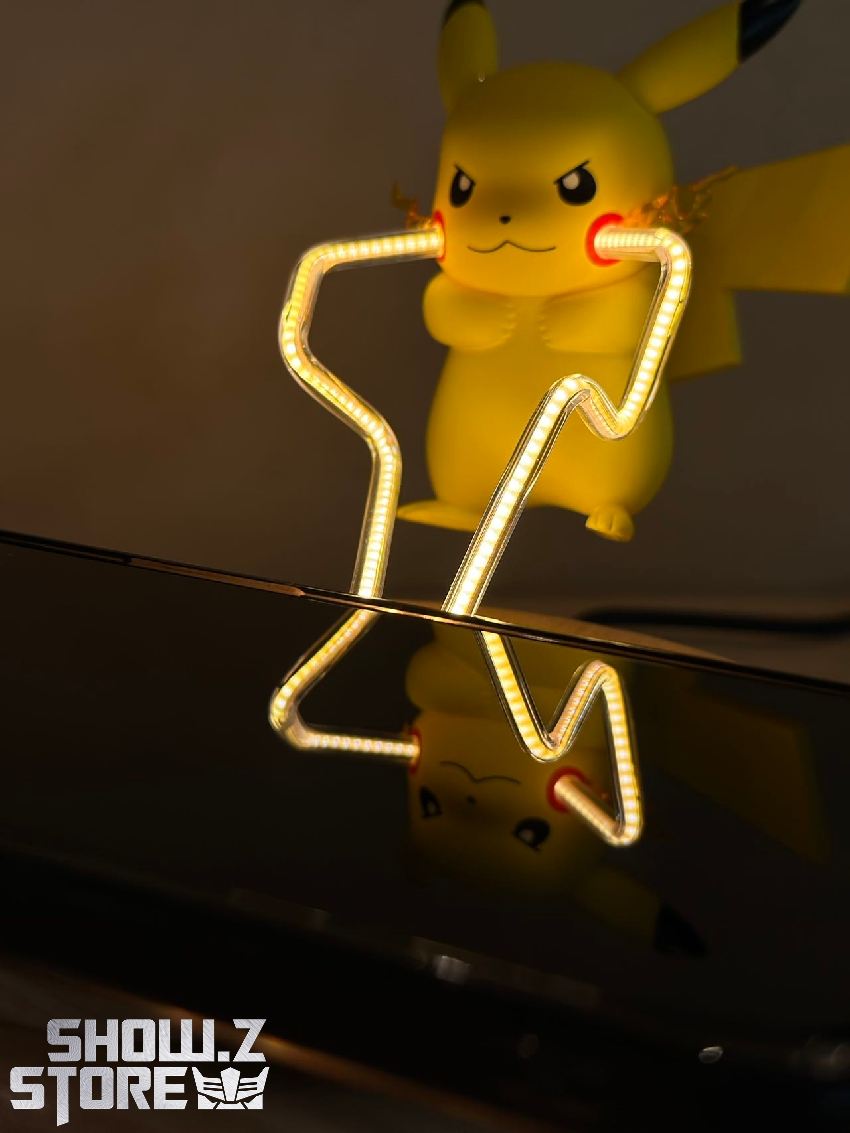 Pikachu magnetic charger with illuminated neon yellow outline design Pikachu magnetic charger with illuminated neon yellow outline design