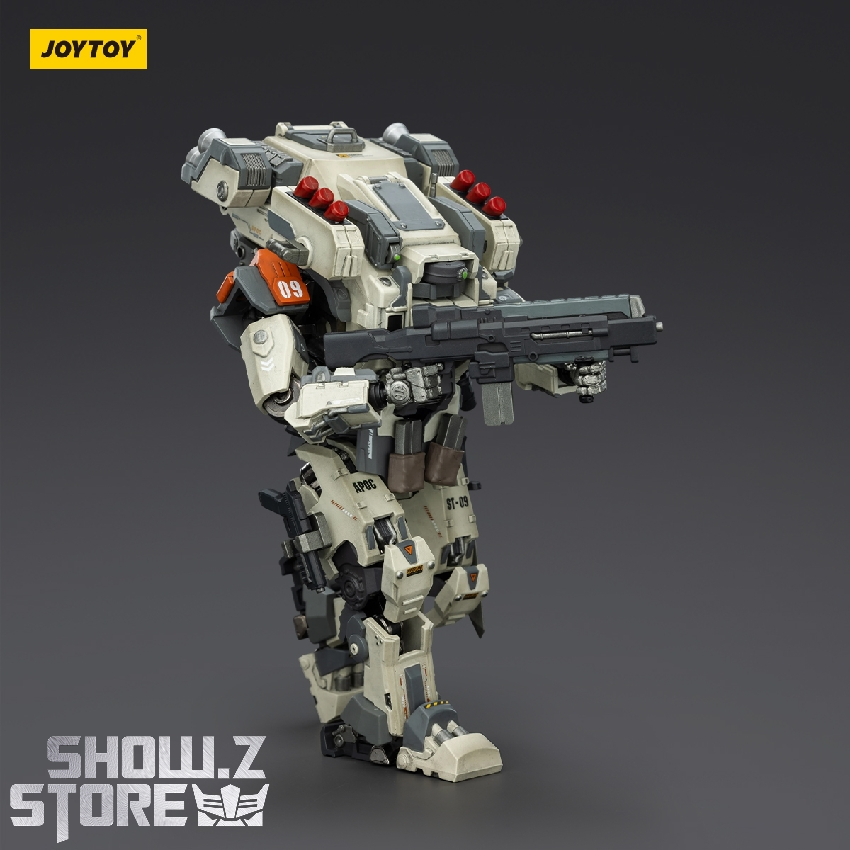 Tan mech with black armor and weapon systems Tan mech with black armor and weapon systems