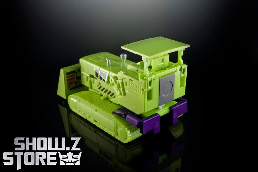 Green and purple construction truck robot in transformation pose Green and purple construction truck robot in transformation pose