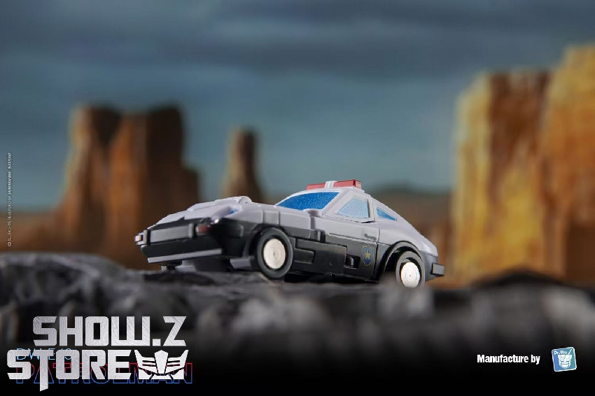White police car form with blue stripe showing realistic vehicle design proportions White police car form with blue stripe showing realistic vehicle design proportions