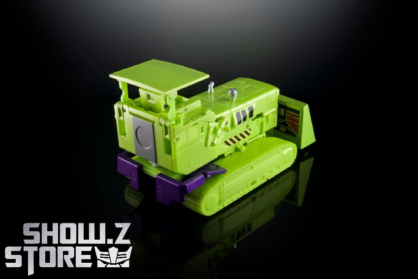 Yellow-green and purple truck-based robot in character mode Yellow-green and purple truck-based robot in character mode