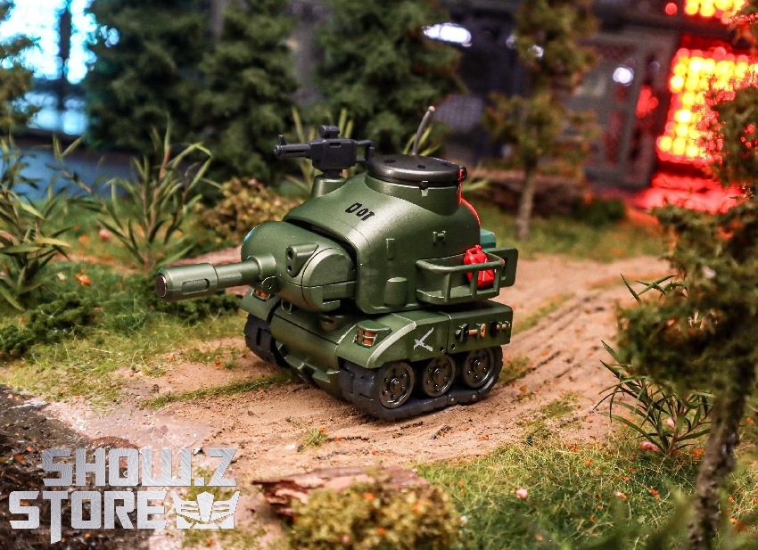 Green armored robot tank figure in outdoor setting Green armored robot tank figure in outdoor setting