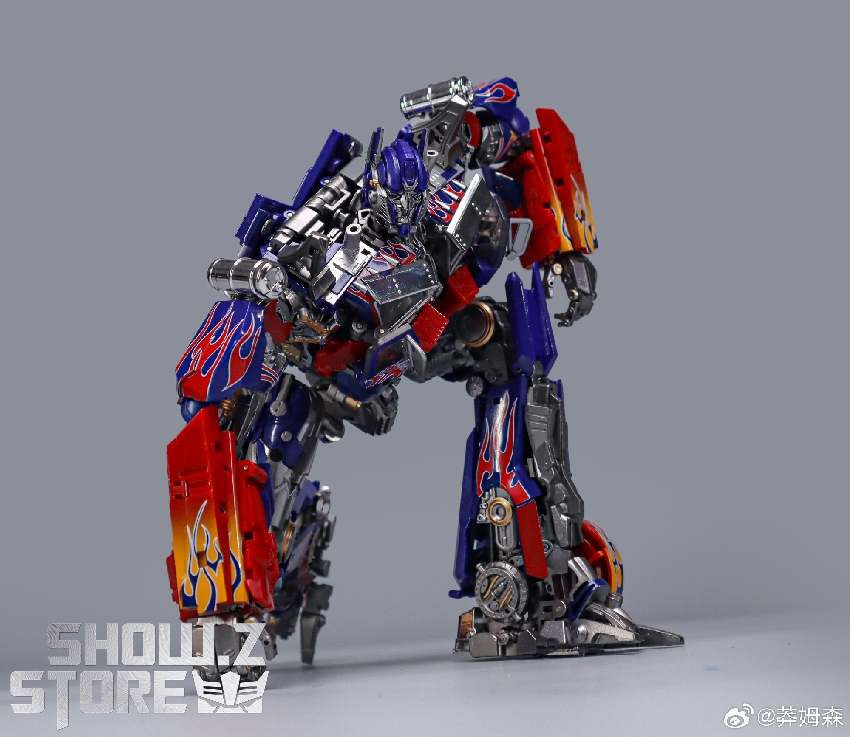 Red blue Transformers robot standing pose with weapons equipped Red blue Transformers robot standing pose with weapons equipped