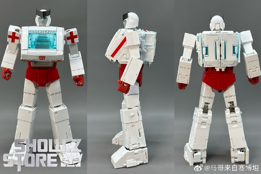 White and red FM-04 Doc Ratchet Transformer model showing front side views White and red FM-04 Doc Ratchet Transformer model showing front side views