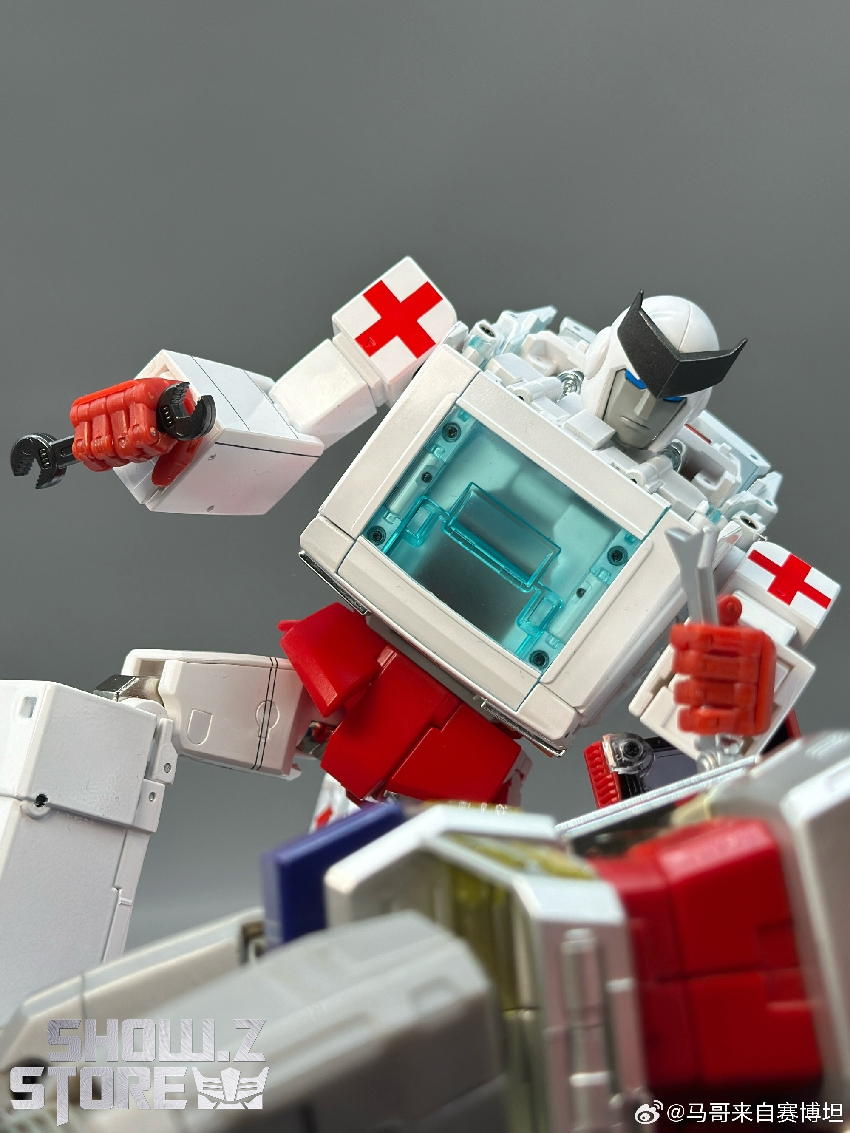 White and red Doc Ratchet Transformer model in robot form healthcare markings White and red Doc Ratchet Transformer model in robot form healthcare markings