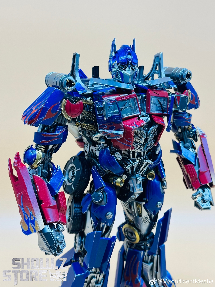 Blue transformer robot with magenta accents and cannon weaponry Blue transformer robot with magenta accents and cannon weaponry