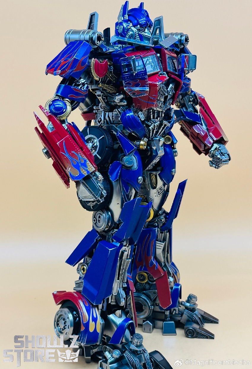 Complete blue transformer with red pink cannon arm attachments Complete blue transformer with red pink cannon arm attachments