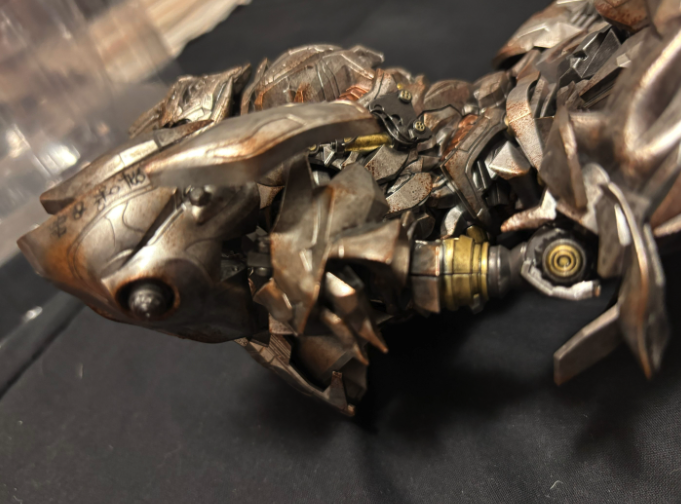 SAMPLE-LH Threezero DLX Megatron (Revenge of the Fallen) (4/69) - left side view SAMPLE-LH Threezero DLX Megatron (Revenge of the Fallen) collectible figure - left side view