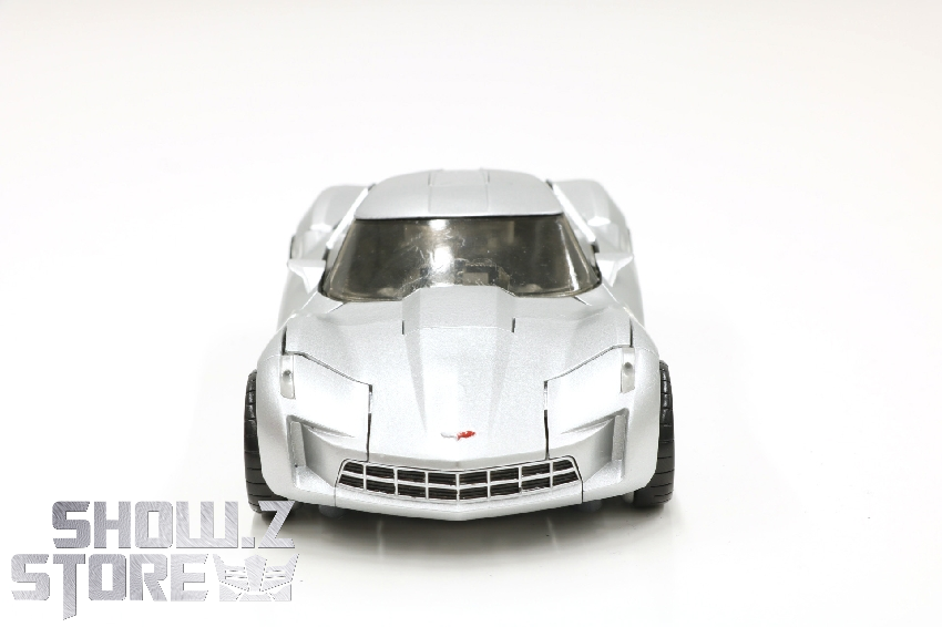 White sports car mode with sleek aerodynamic design and black accents White sports car mode with sleek aerodynamic design and black accents