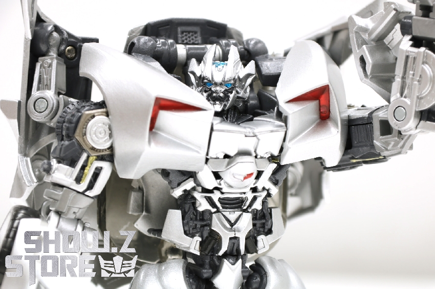 Robot front view displaying chest panel and articulated arms raised Robot front view displaying chest panel and articulated arms raised