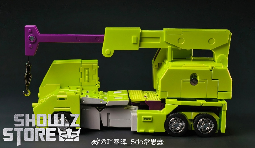 Bright neon yellow truck form with extended hook and trailer configuration Bright neon yellow truck form with extended hook and trailer configuration
