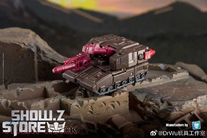 Pink wheeled transport positioned on rocky terrain showing industrial heavy styling Pink wheeled transport positioned on rocky terrain showing industrial heavy styling