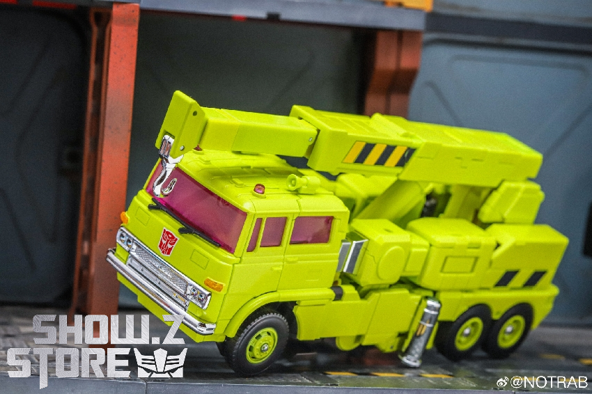 Hauler MPG-18 green yellow truck robot crane transformation feature Hauler MPG-18 green yellow truck robot crane transformation feature