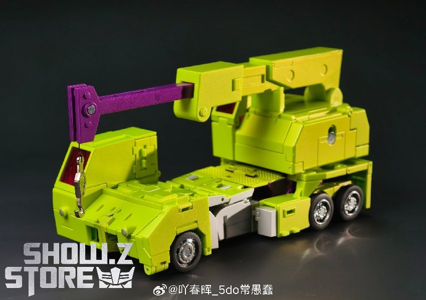 Yellow construction vehicle in robot mode with articulated limbs extensions Yellow construction vehicle in robot mode with articulated limbs extensions