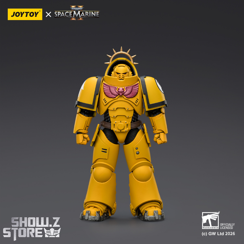 Imperial Fists Heavy Intercessor in yellow armor with chapter symbol Imperial Fists Heavy Intercessor in yellow armor with chapter symbol