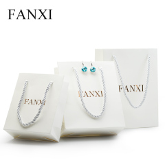 FANXI Custom Logo Packing Bags For Jewelry Watch Cloth Cosmetic Gift Shop White Coated Paper Packaging Bag