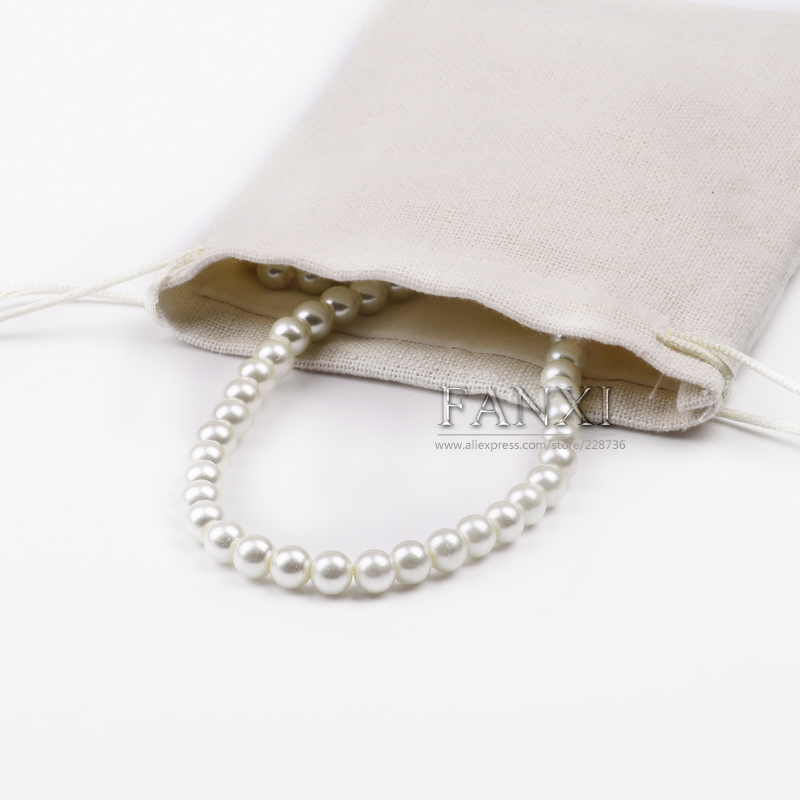 FANXI Wholesale OEM Jewelry Bag With Velvet Insert For Ring Necklace Bracelet Gift Custom Logo Beige Linen Jewellery Packaging Pouch