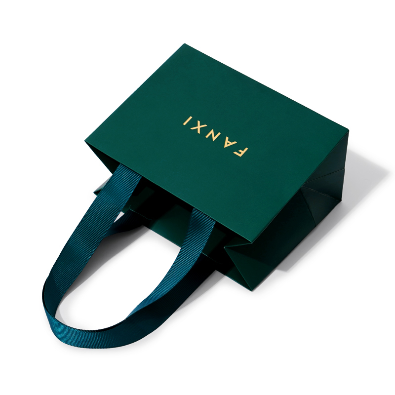 Dark green paper jewelry bag with matching ribbon